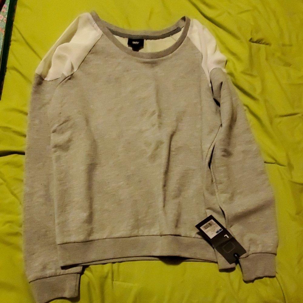 Sweater with sheer details.